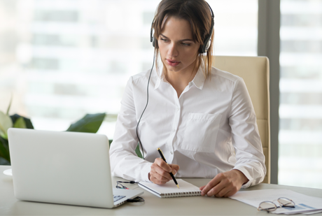 Woman listening to webinar